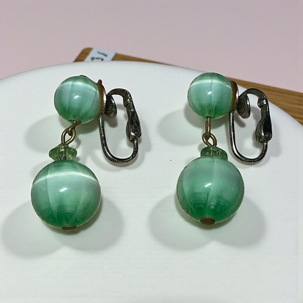 Elegant Green Moonglow Clip-On Earrings